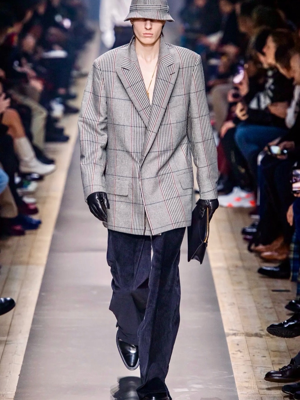 Dunhill plaid coat with peak lapels.